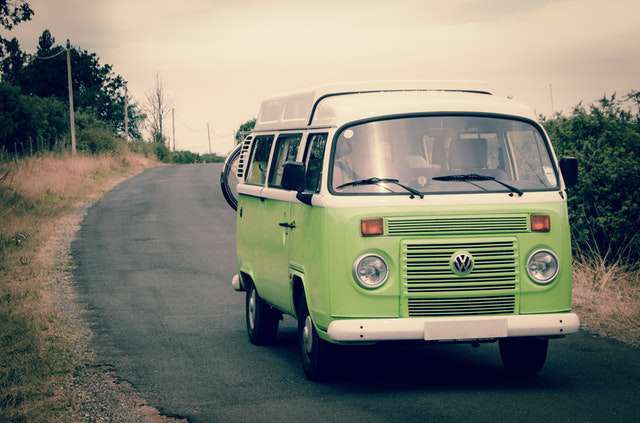 green-and-white-volkswagen-combi-bus img